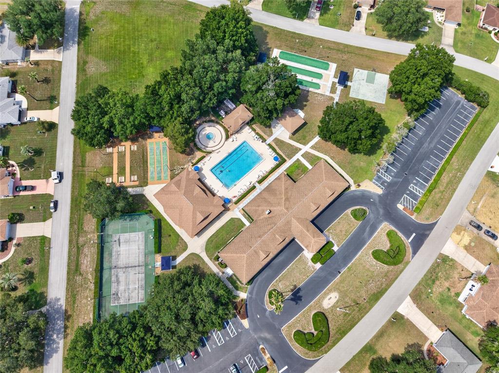6032 Southwest 103rd Loop Ocala, FL 34476 - Photo 27 of 28 an aerial view of a house with a yard
