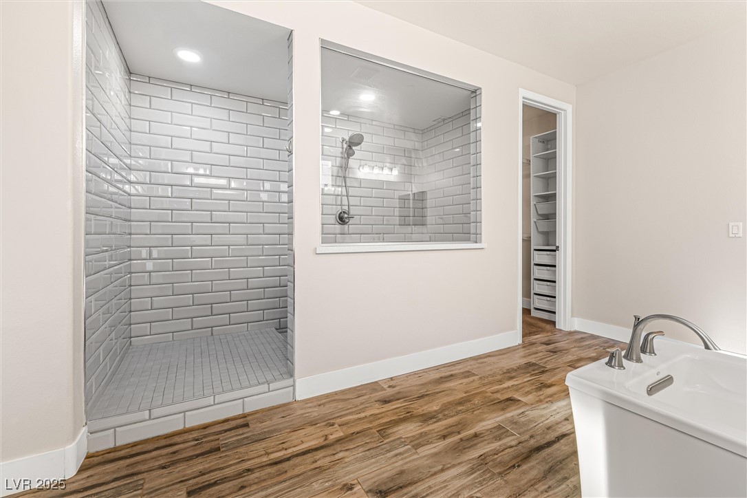 4631 Amazing View Street Las Vegas, NV 89129 - Photo 33 of 94 Laundry area with wood finished floors and recessed lighting