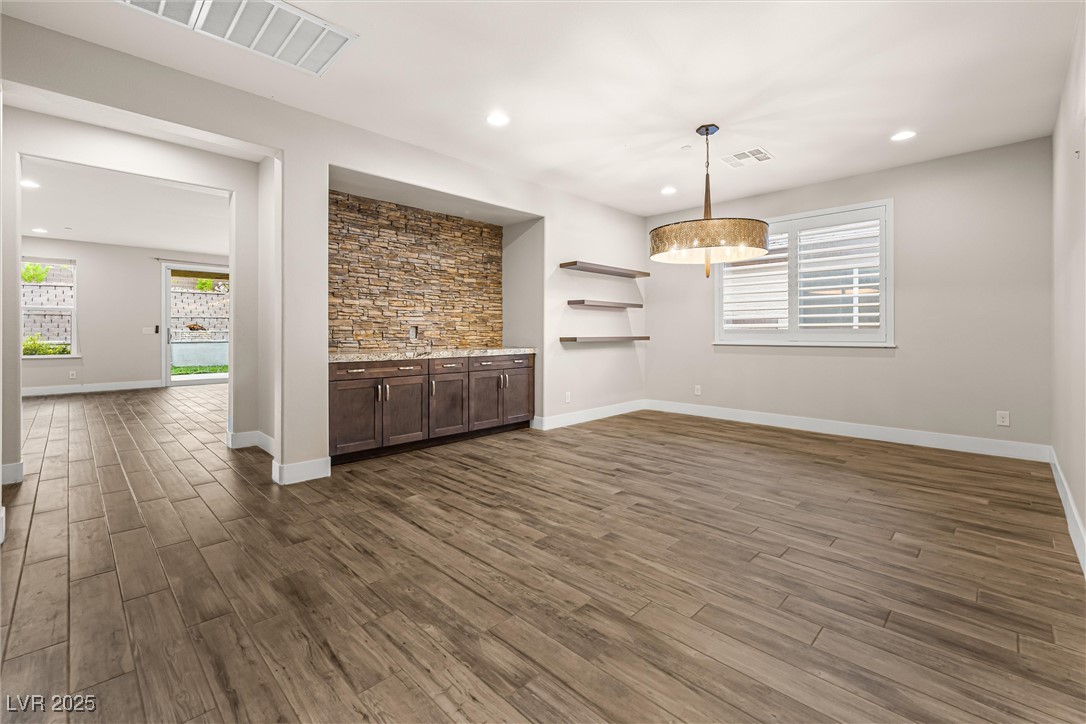4631 Amazing View Street Las Vegas, NV 89129 - Photo 35 of 94 Unfurnished dining area featuring dark wood-type flooring and recessed lighting