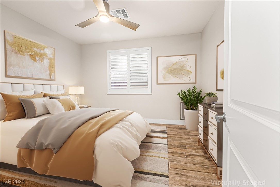 4631 Amazing View Street Las Vegas, NV 89129 - Photo 42 of 94 Bedroom with light wood finished floors and ceiling fan