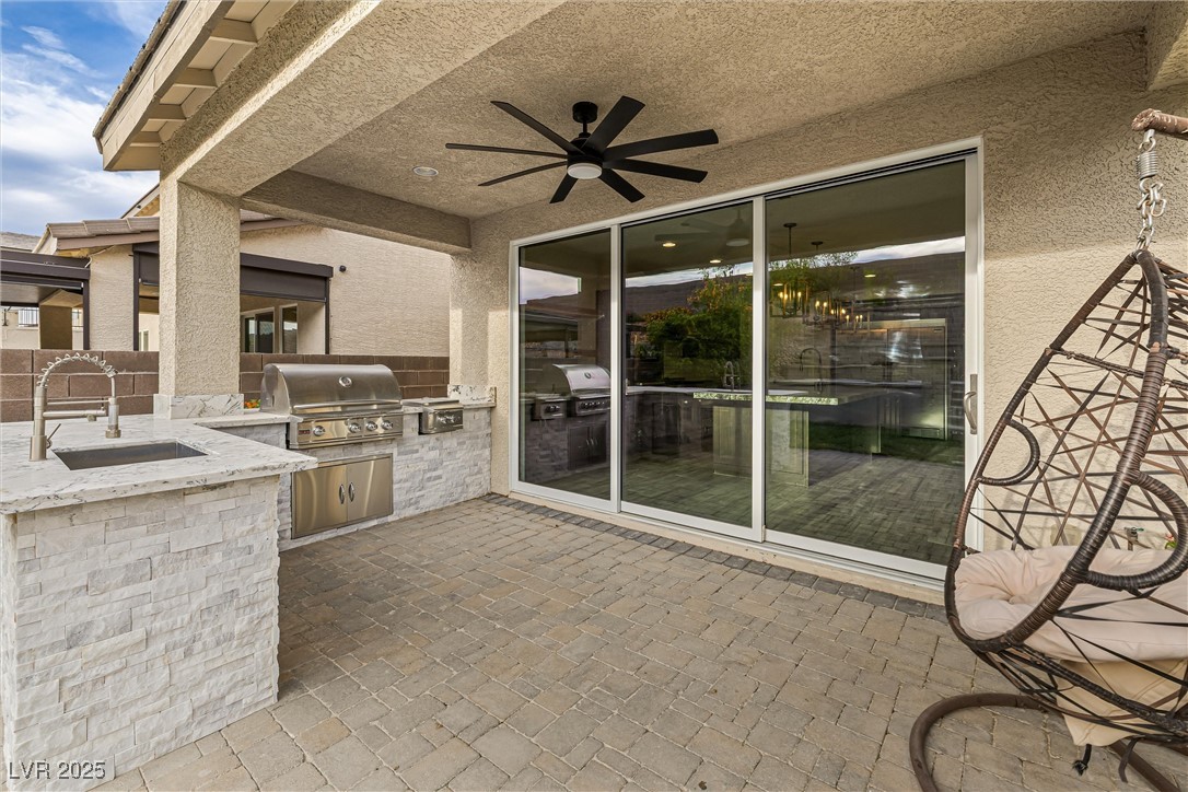 4631 Amazing View Street Las Vegas, NV 89129 - Photo 85 of 94 View of patio / terrace featuring an outdoor kitchen and ceiling fan