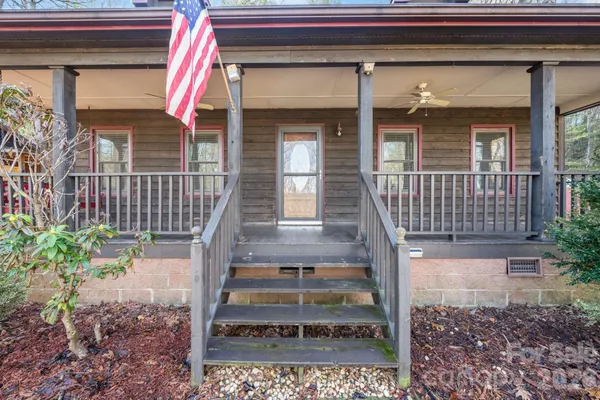 a front view of a house with a porch