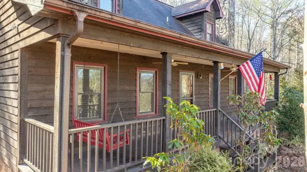 a view of a house with a flower garden