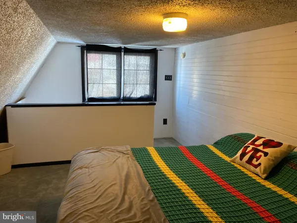 a room with table and chairs