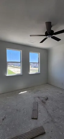 a view of an empty room and window