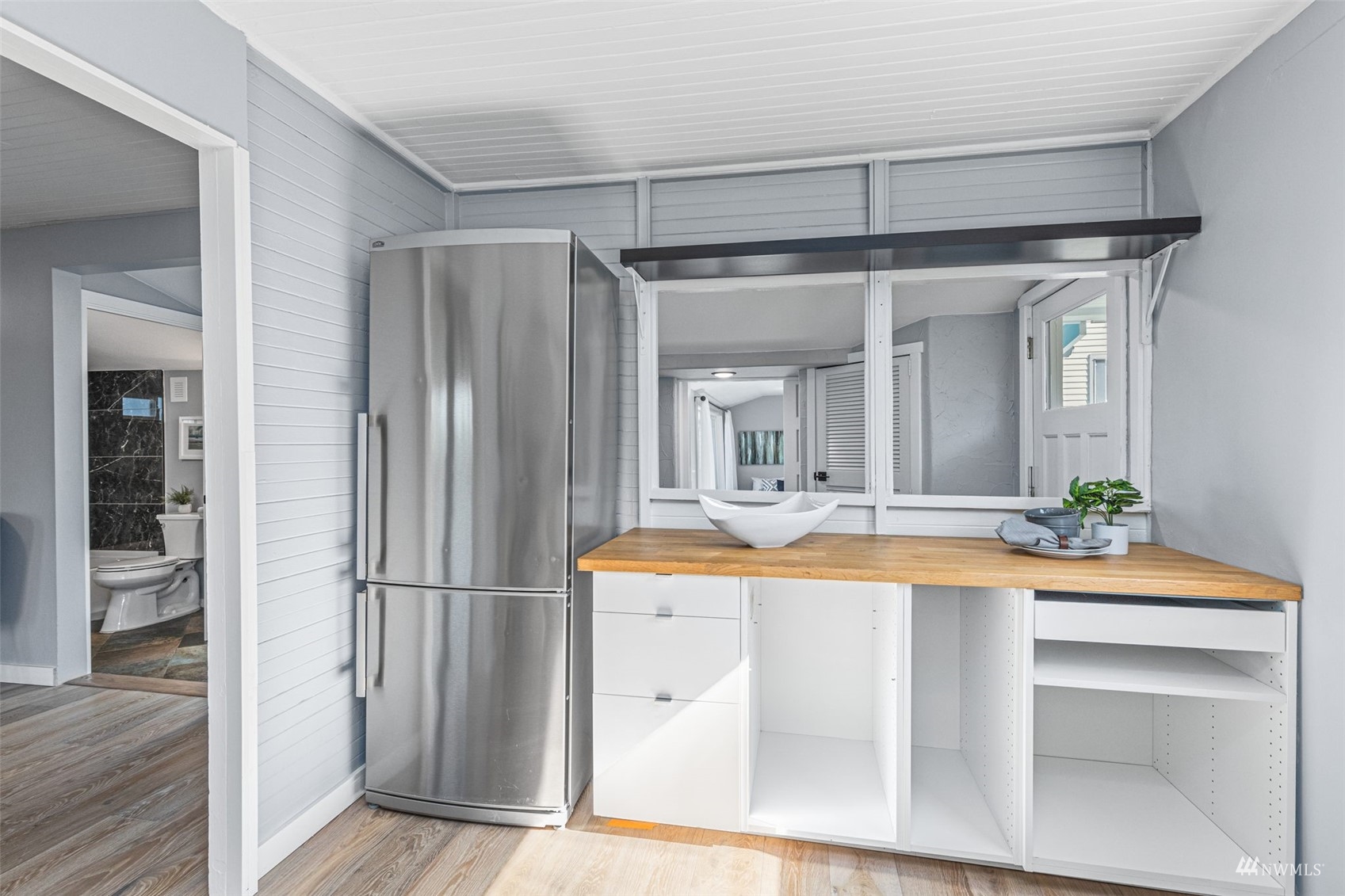 1542 30th Avenue South Seattle, WA 98144 - Photo 15 of 39 a room with closet and mirror