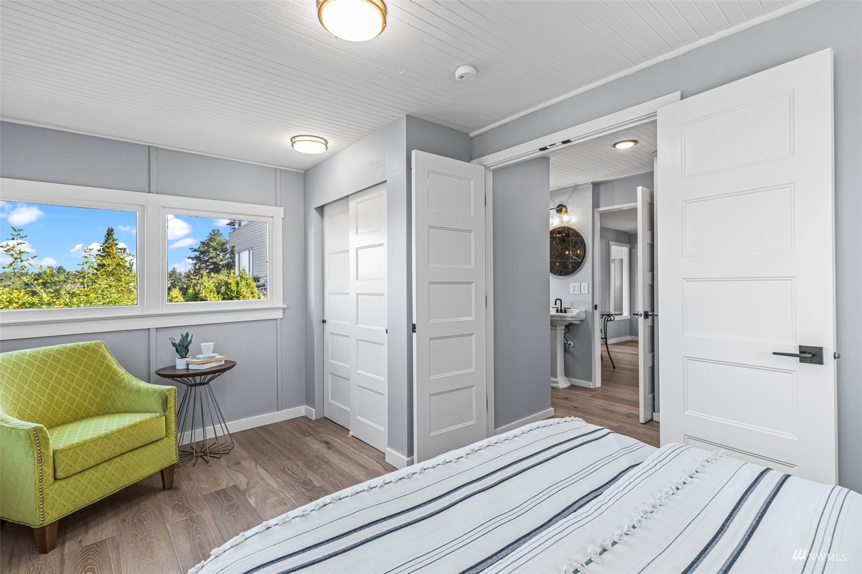 1542 30th Avenue South Seattle, WA 98144 - Photo 23 of 39 a bedroom with a bed and a couch