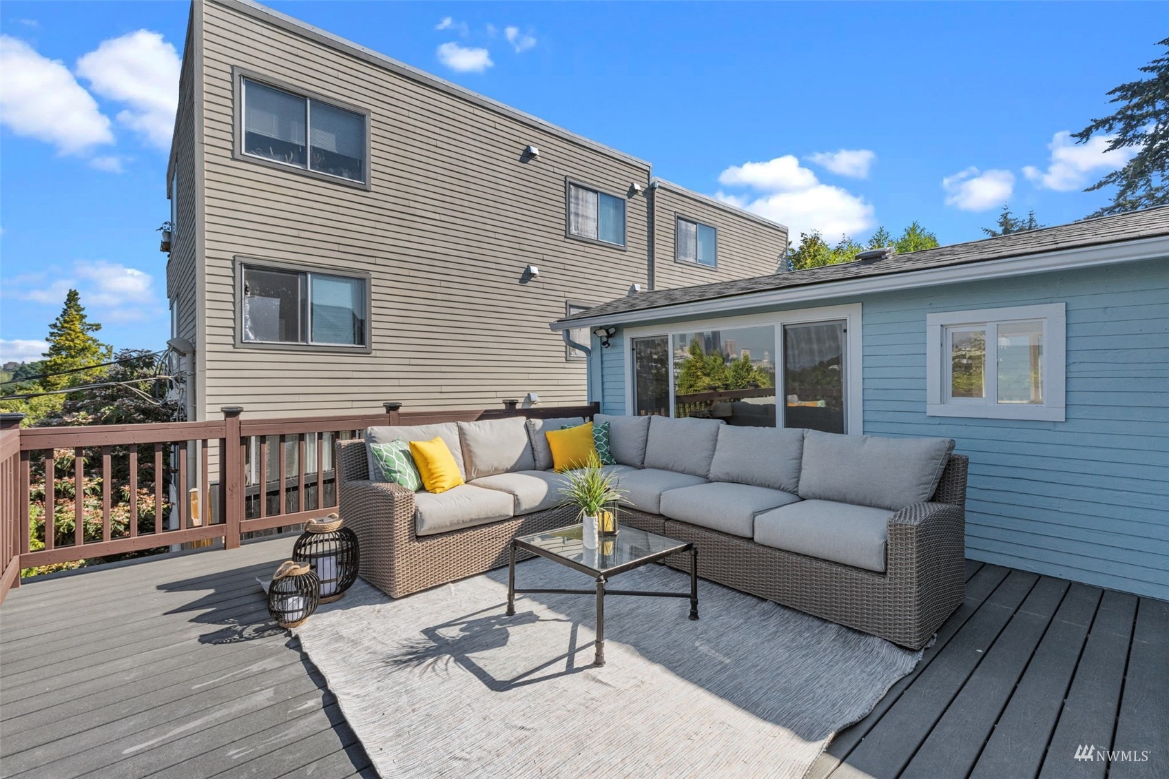 1542 30th Avenue South Seattle, WA 98144 - Photo 30 of 39 a balcony with furniture and a potted plant