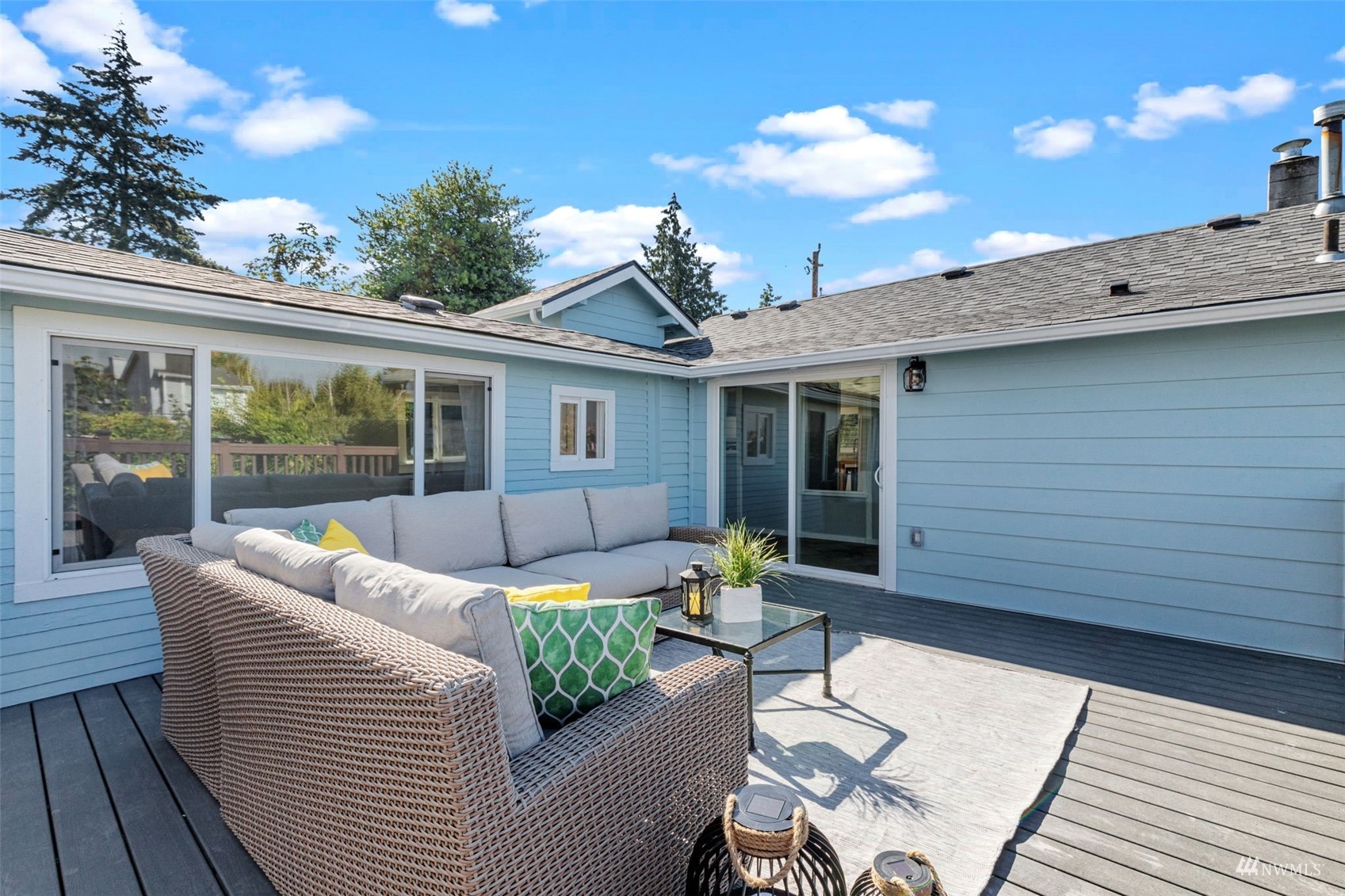1542 30th Avenue South Seattle, WA 98144 - Photo 31 of 39 a view of a patio with couches table and chairs and potted plants