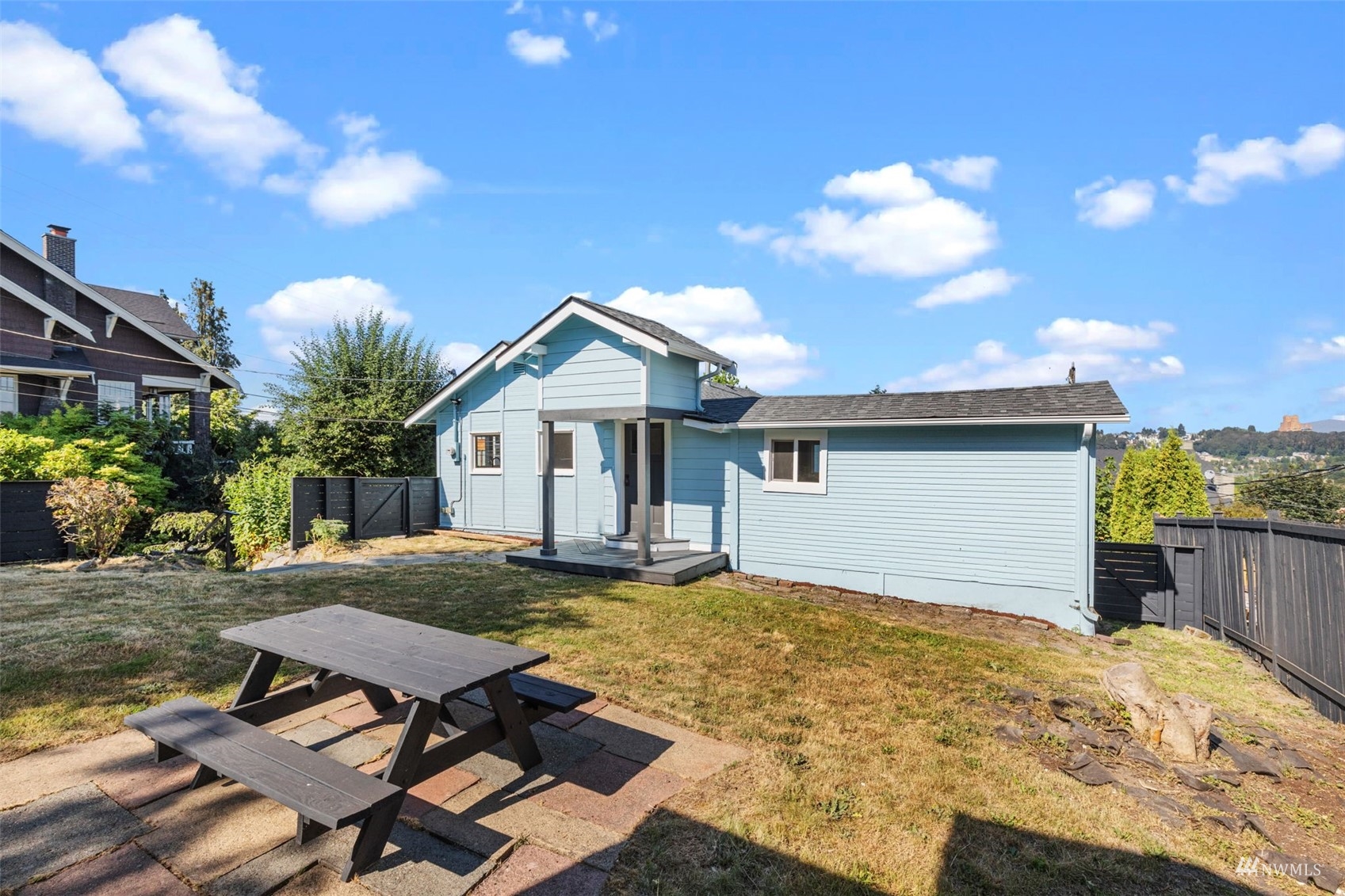 1542 30th Avenue South Seattle, WA 98144 - Photo 32 of 39 a view of a house with backyard and sitting area