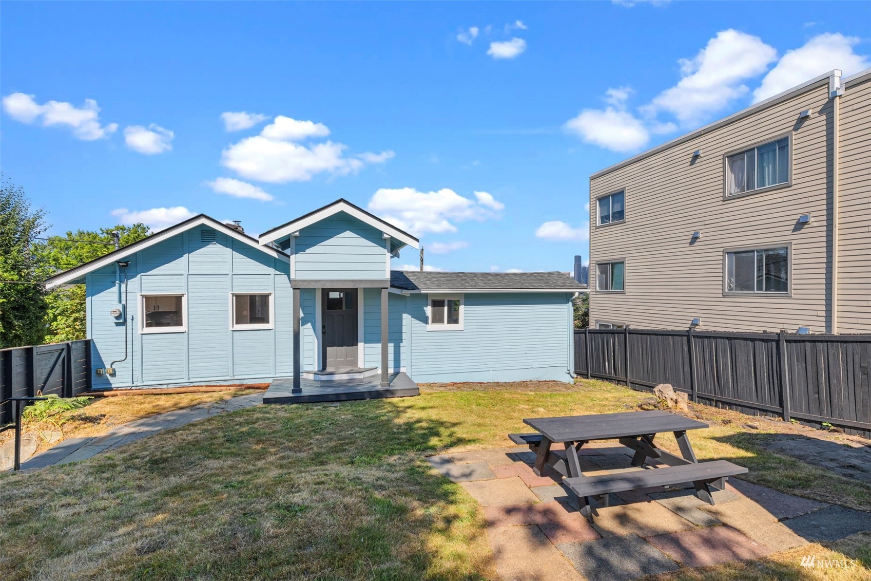 1542 30th Avenue South Seattle, WA 98144 - Photo 33 of 39 a view of a house with pool and wooden fence