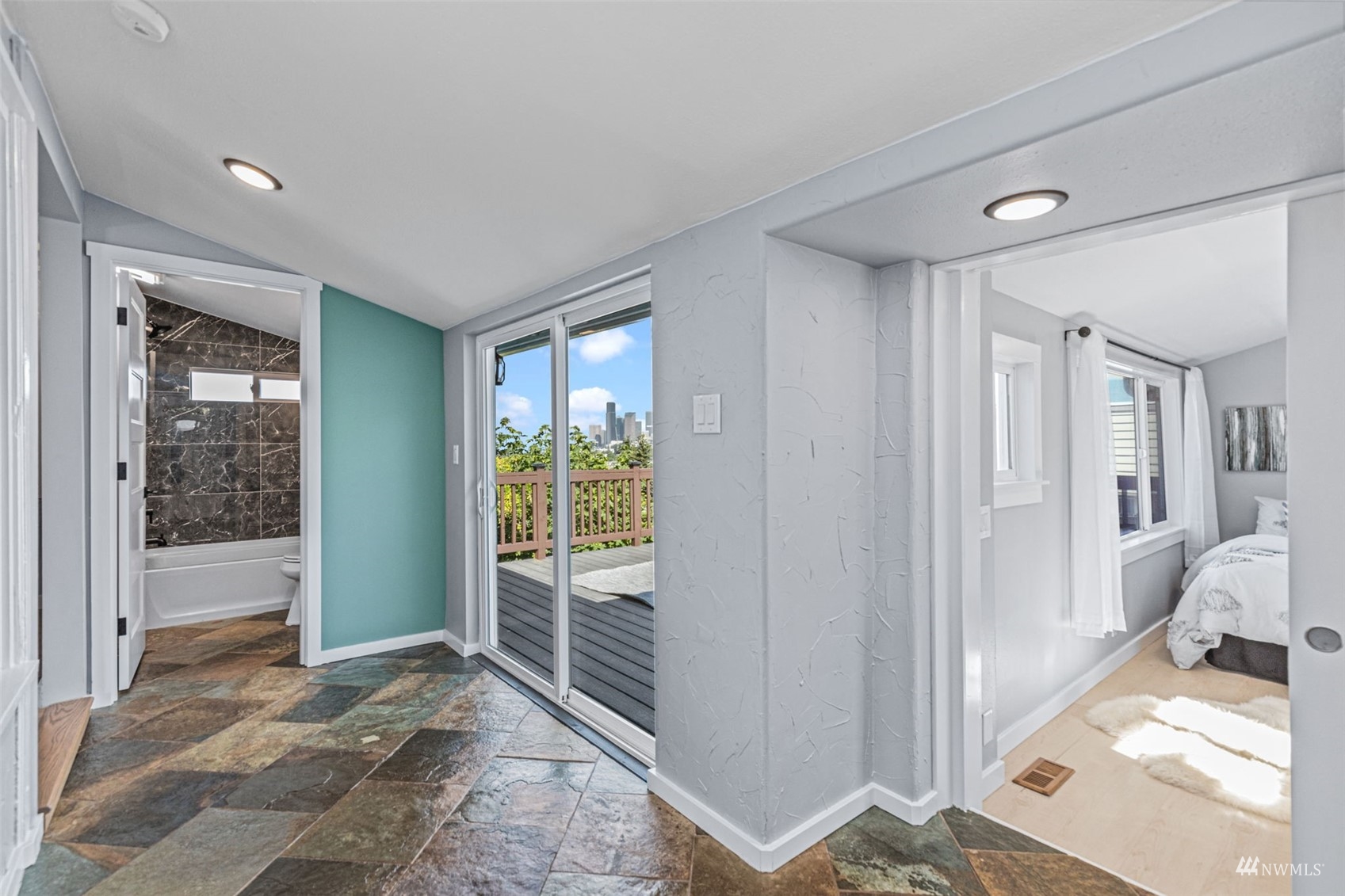 1542 30th Avenue South Seattle, WA 98144 - Photo 4 of 39 a view of a room that has a bed and a window