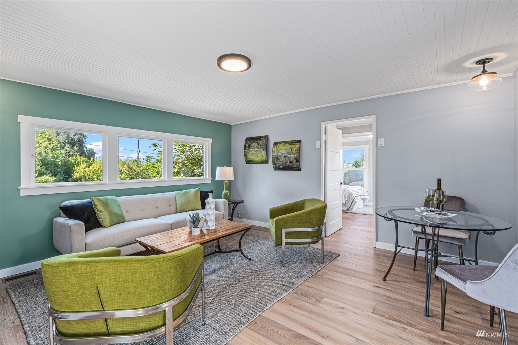 1542 30th Avenue South Seattle, WA 98144 - Photo 5 of 39 a living room with furniture and a large window