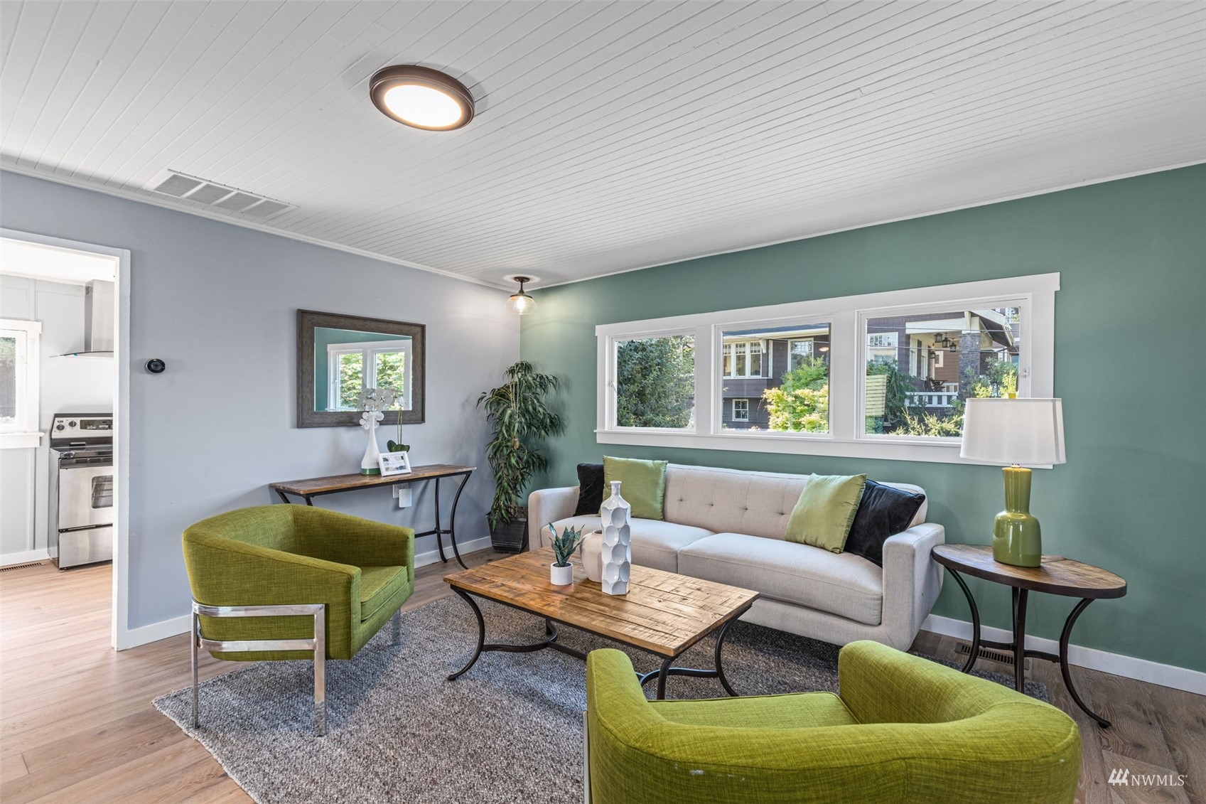 1542 30th Avenue South Seattle, WA 98144 - Photo 6 of 39 a living room with furniture and a potted plant