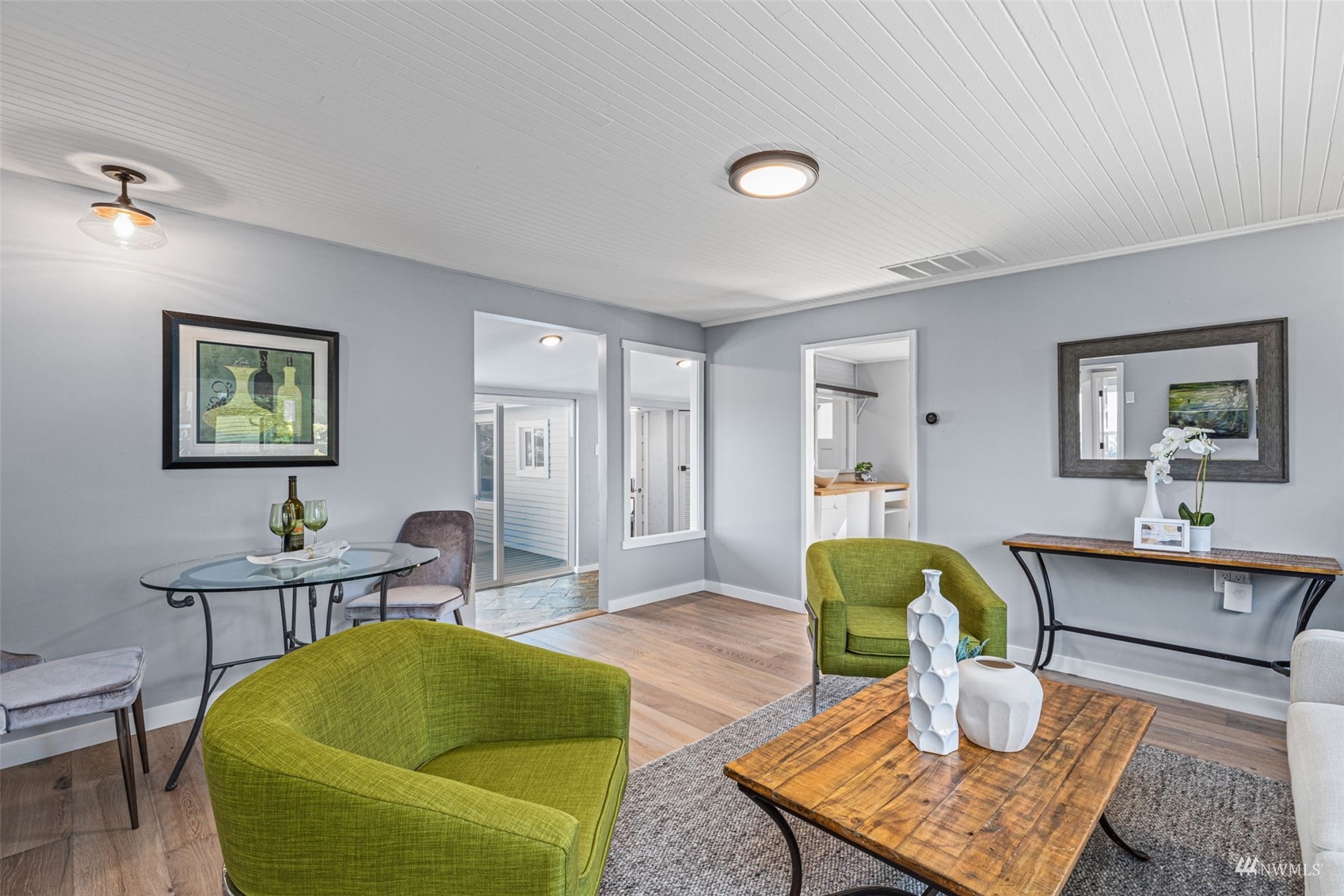 1542 30th Avenue South Seattle, WA 98144 - Photo 7 of 39 a living room with furniture and a wooden floor