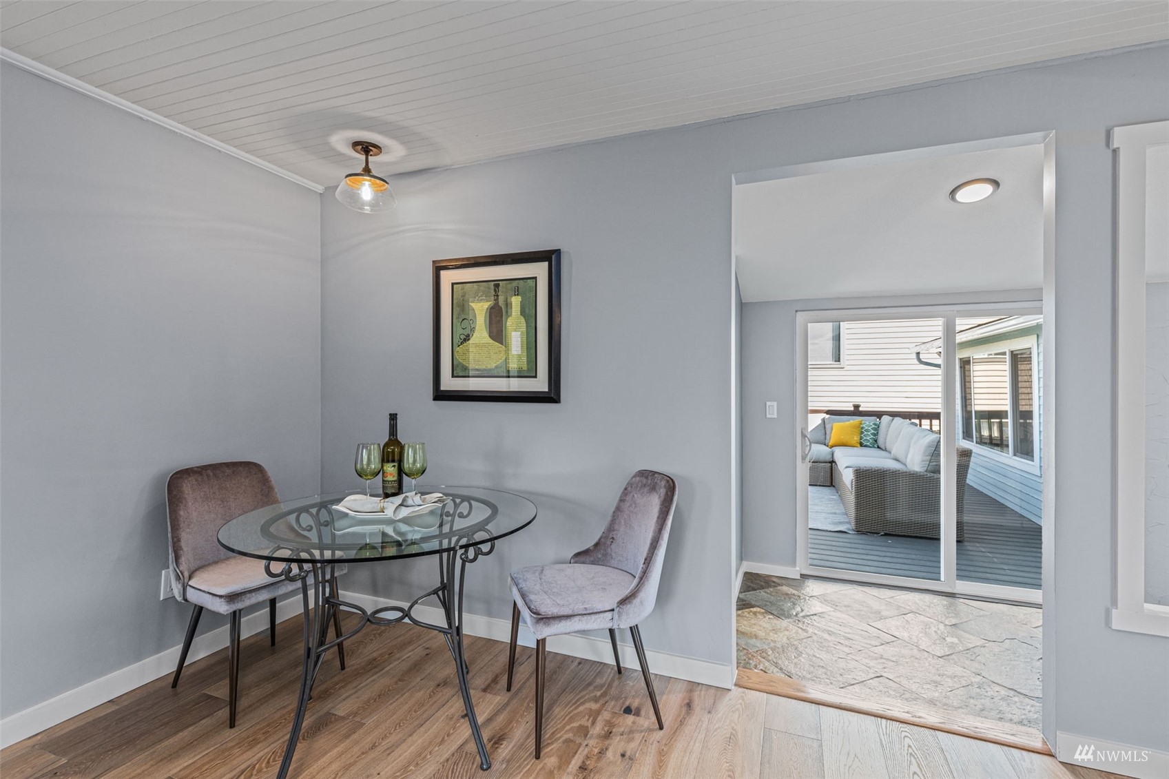 1542 30th Avenue South Seattle, WA 98144 - Photo 9 of 39 a view of a dining room with furniture and wooden floor