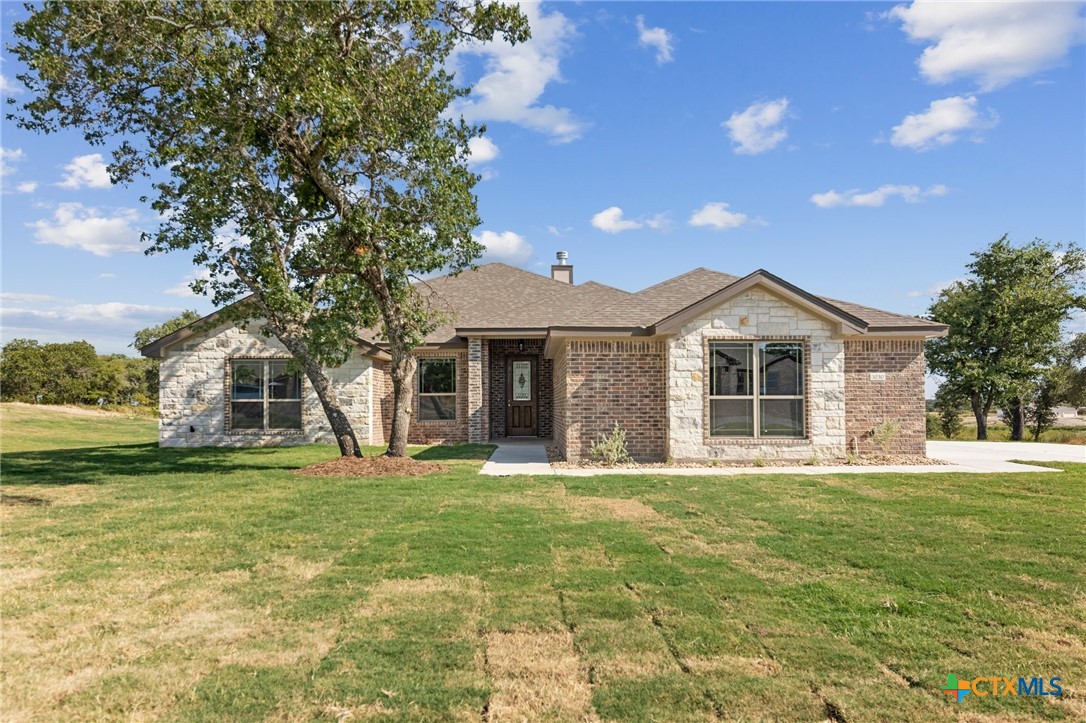 3030 Millhouse Road Copperas Cove, TX 76522 - Photo 1 of 24 a front view of a house with a yard