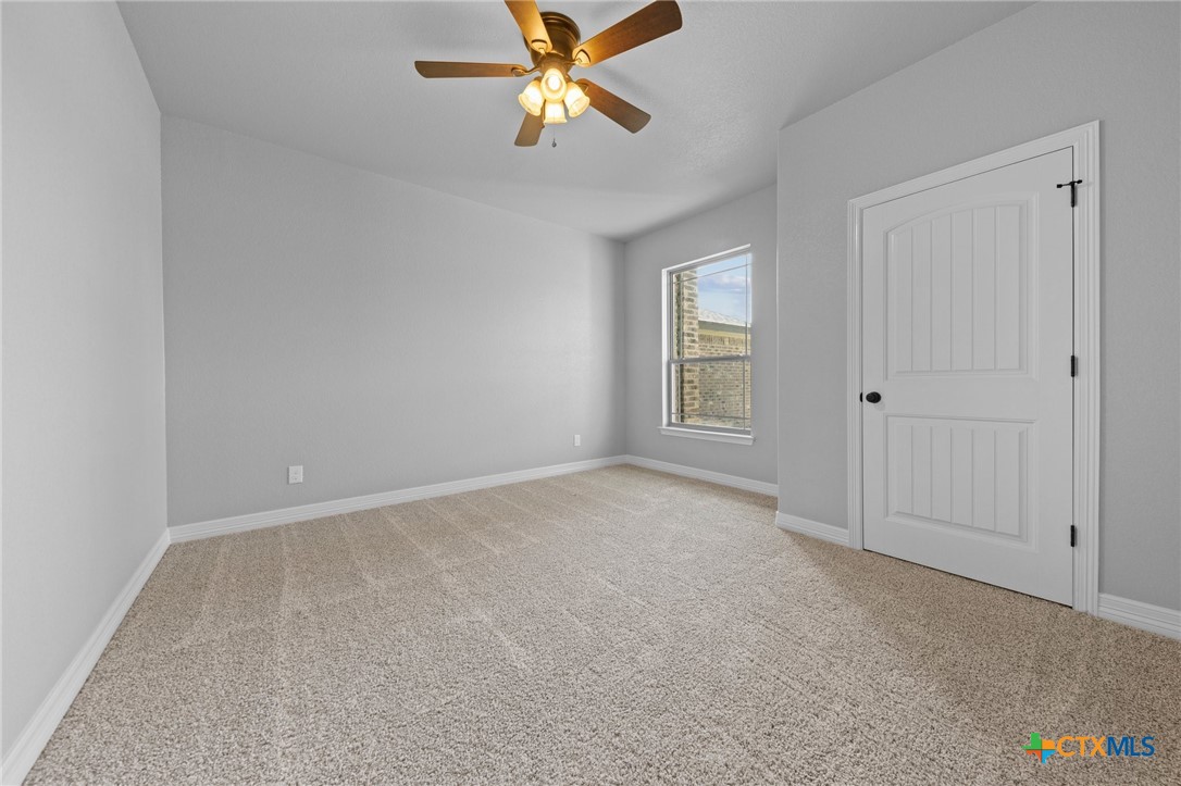 3030 Millhouse Road Copperas Cove, TX 76522 - Photo 12 of 24 a view of an empty room with a window