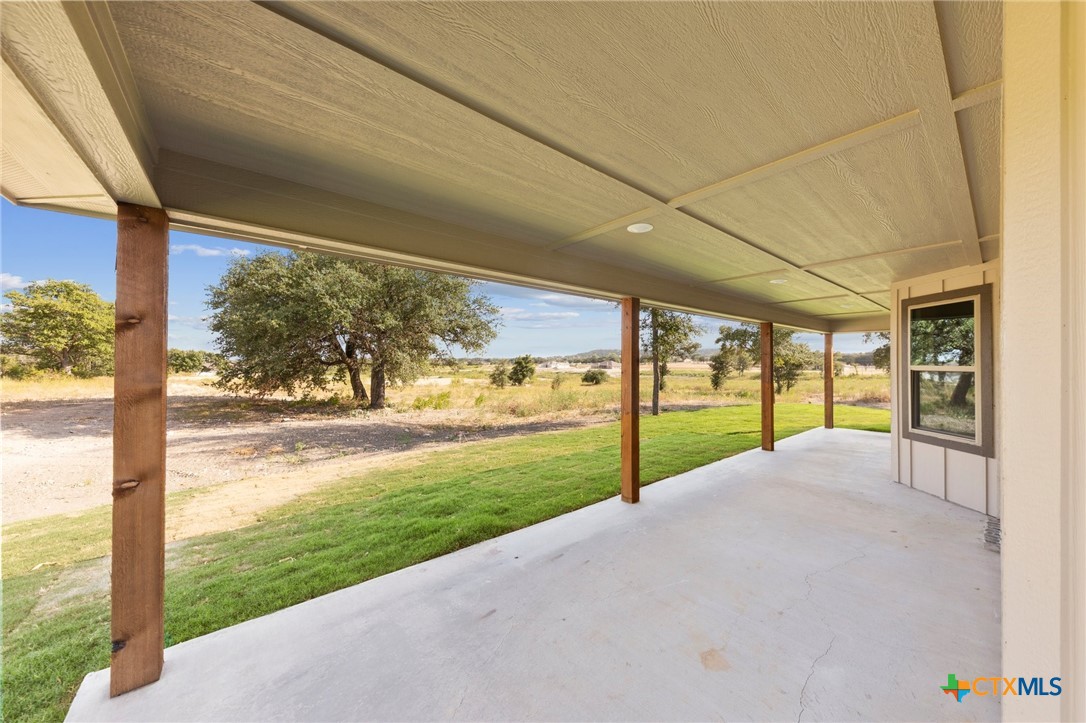 3030 Millhouse Road Copperas Cove, TX 76522 - Photo 20 of 24 a view of a garden with an outdoor space