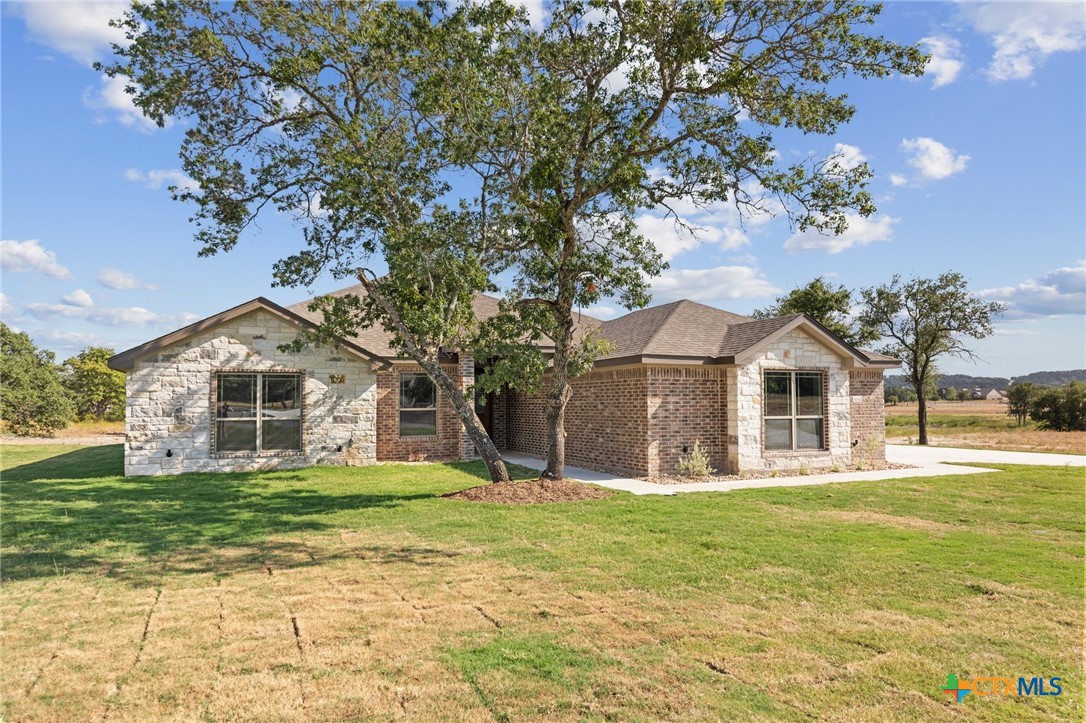 3030 Millhouse Road Copperas Cove, TX 76522 - Photo 2 of 24 a front view of a house with a yard