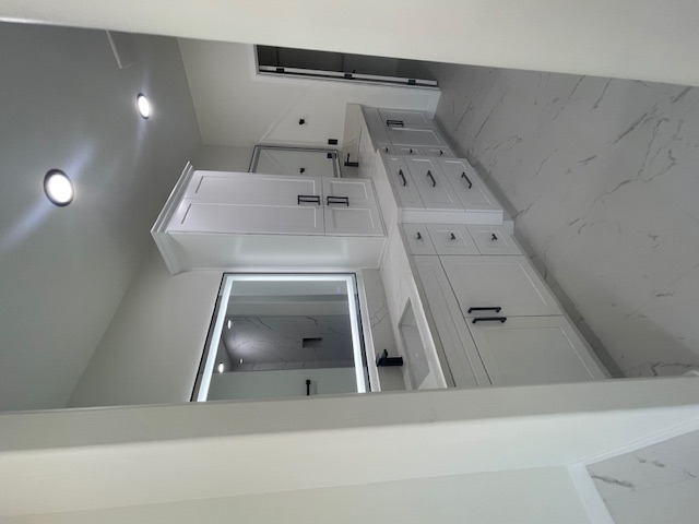 2367 Corwin Road Bullhead City, AZ 86442 - Photo 28 of 45 a bathroom with a double vanity sink and mirror
