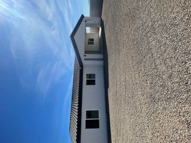 2367 Corwin Road Bullhead City, AZ 86442 - Photo 39 of 45 a big house with a big yard and large tree