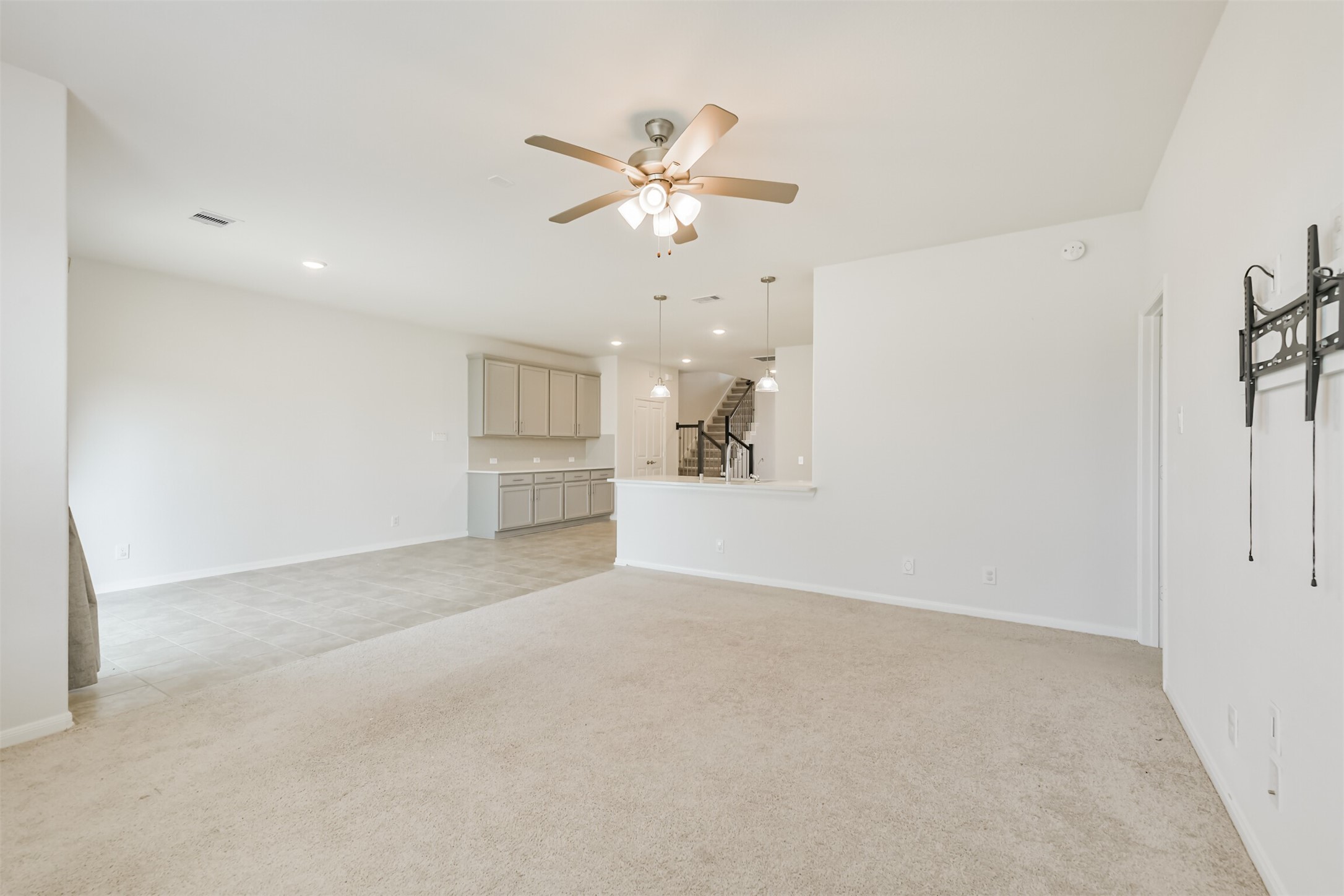 2129 Solstice Boulevard Spring, TX 77386 - Photo 19 of 49 Shot from the living area into the kitchen and eat in dining!