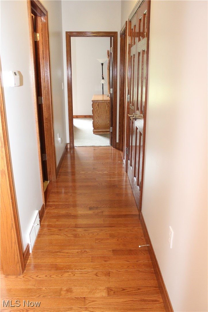 4901 New Castle Road Lowellville, OH 44436 - Photo 31 of 50 Hardwood Floor Hallway