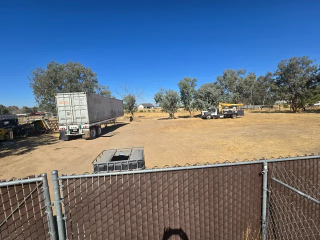 a view of a street with an ocean view