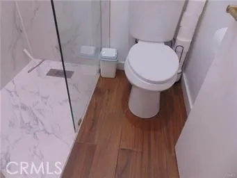 a bathroom with a toilet and a sink