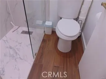 a bathroom with a toilet and a sink
