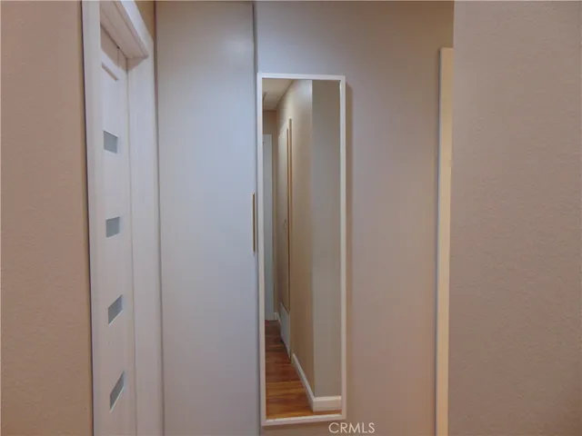 a view of a kitchen and a window