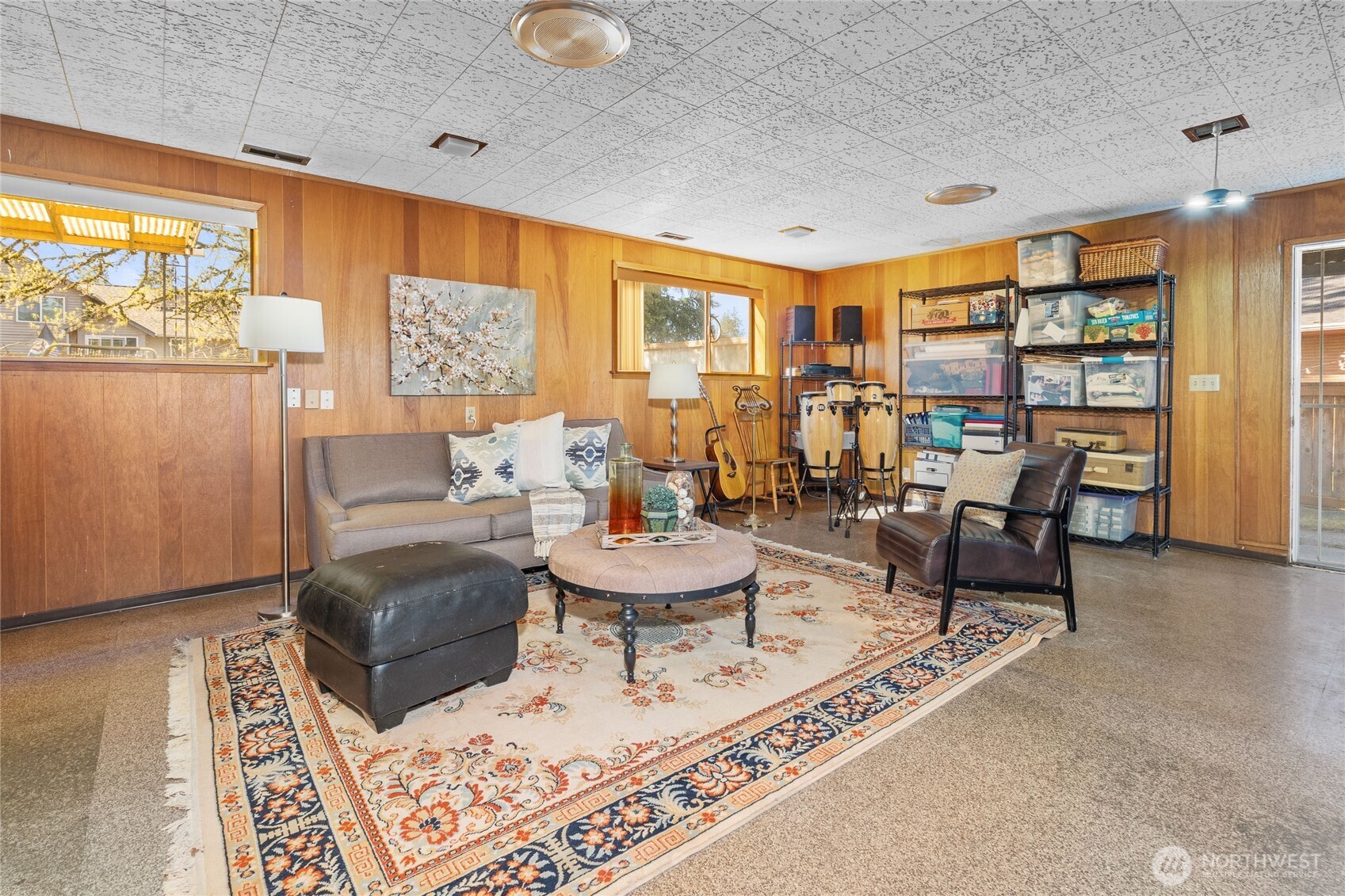 513 Harrington Avenue Northeast Renton, WA 98056 - Photo 20 of 33 a living room with furniture and a large window
