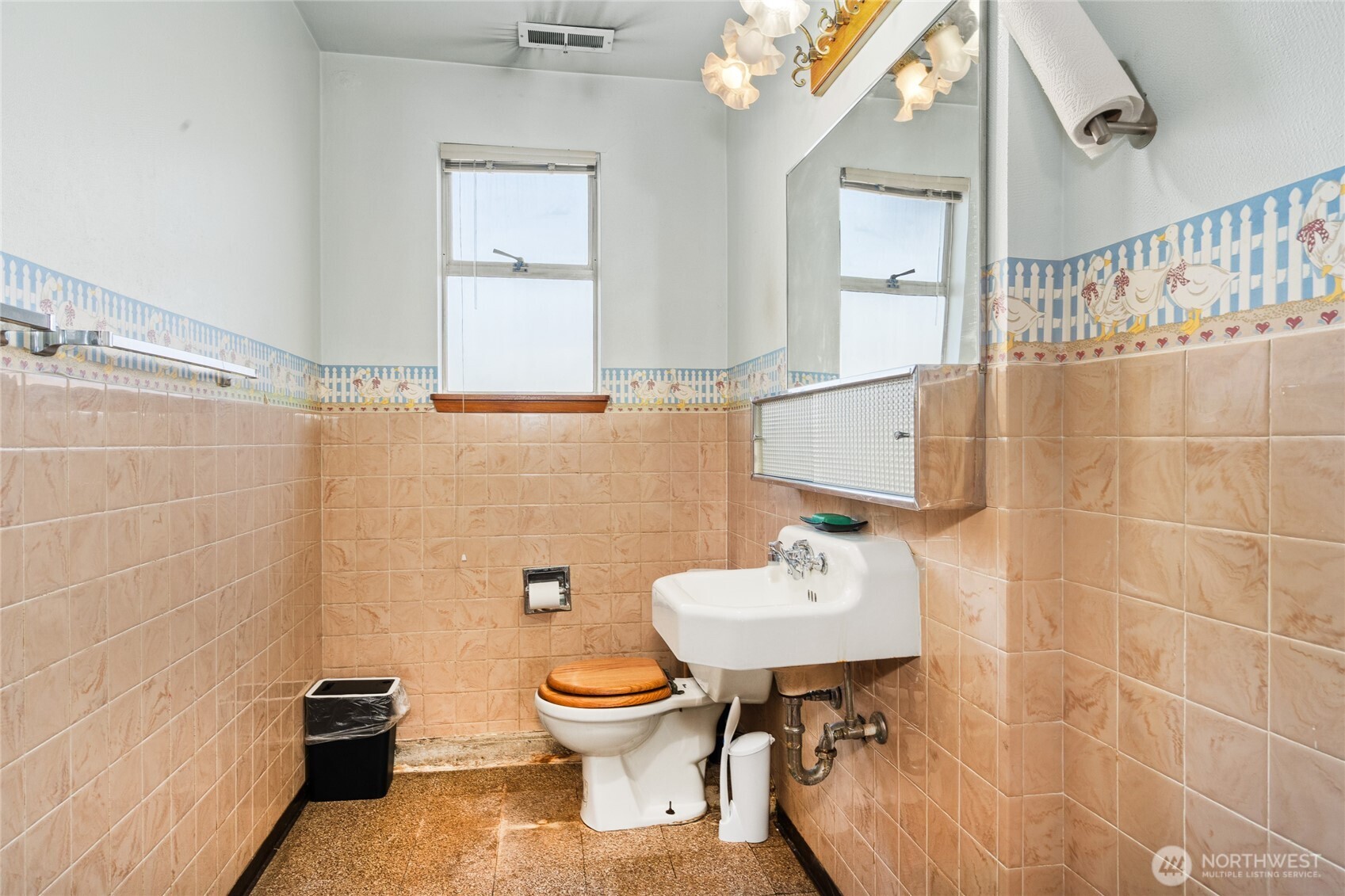 513 Harrington Avenue Northeast Renton, WA 98056 - Photo 24 of 33 a bathroom with a sink toilet and shower