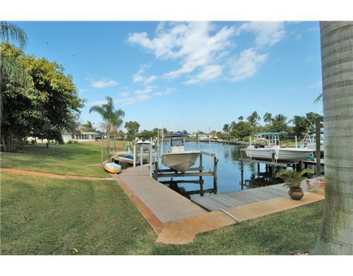 112 Northwest S Shore Road Stuart, FL 34994 - Photo 3 of 16 a view of a park with large trees