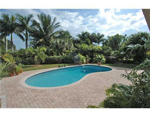 112 Northwest S Shore Road Stuart, FL 34994 - Photo 4 of 16 a view of pool with a yard