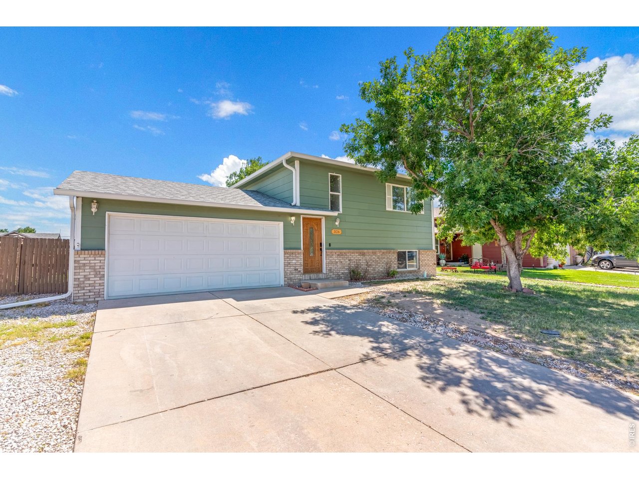 526 East 23rd Street Road Greeley, CO 80631 - Photo 17 of 20 a view of garage and yard