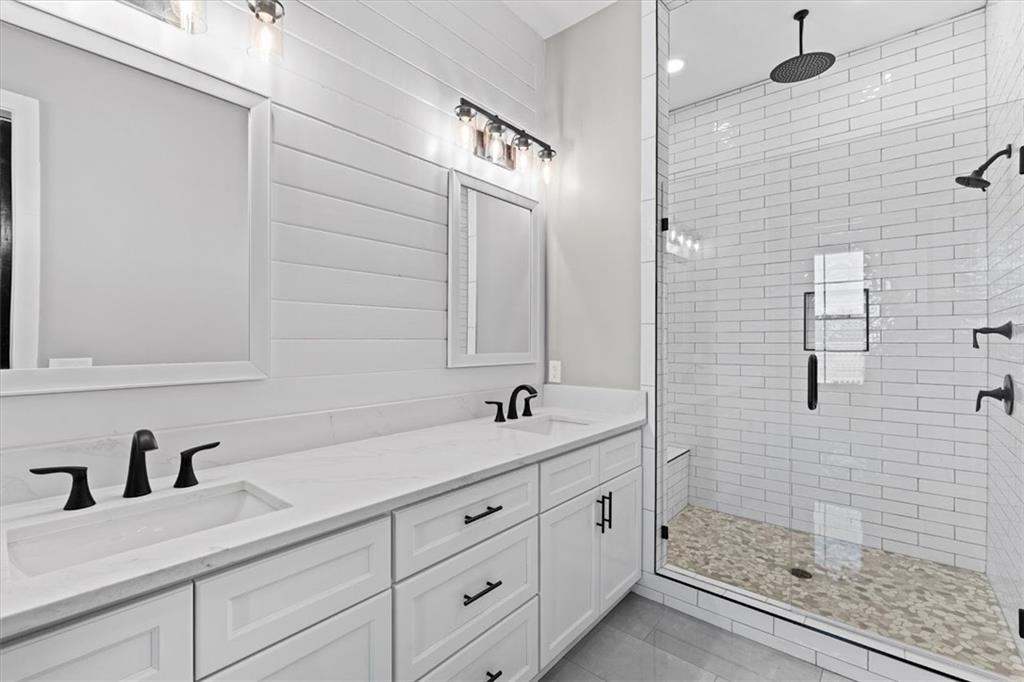 1237 Morgan Road Temple, GA 30179 - Photo 24 of 52 a bathroom with a sink and a mirror