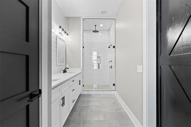 a view of a room with wooden floor and cabinet