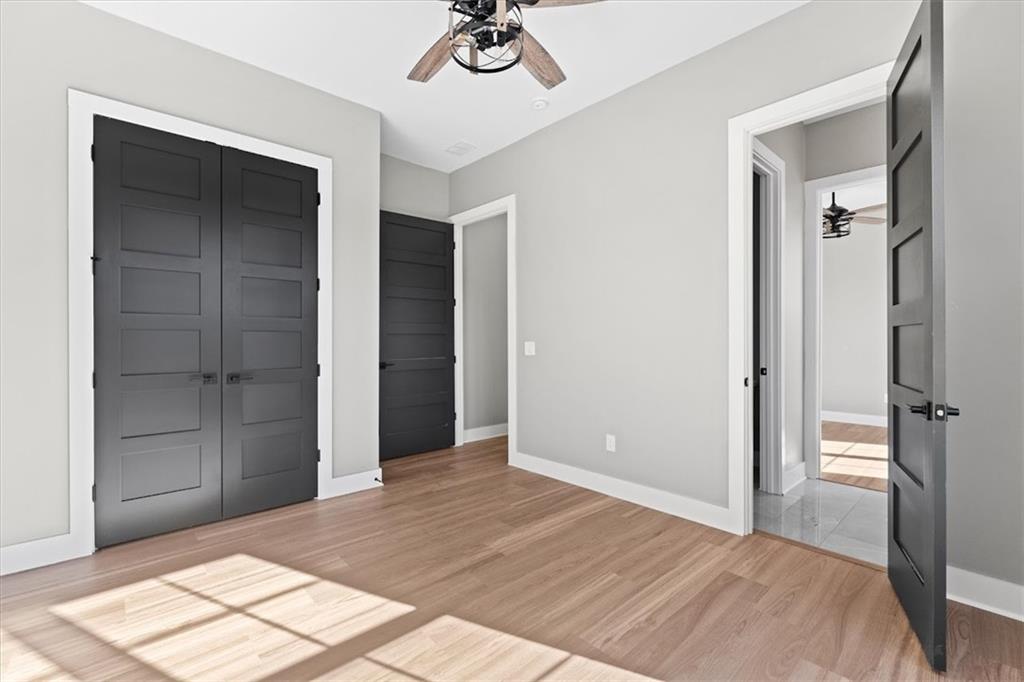 1237 Morgan Road Temple, GA 30179 - Photo 27 of 52 a view of a room with wooden floor and cabinet