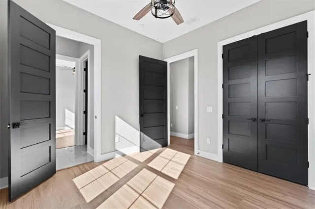 a bathroom with a bathtub and a toilet