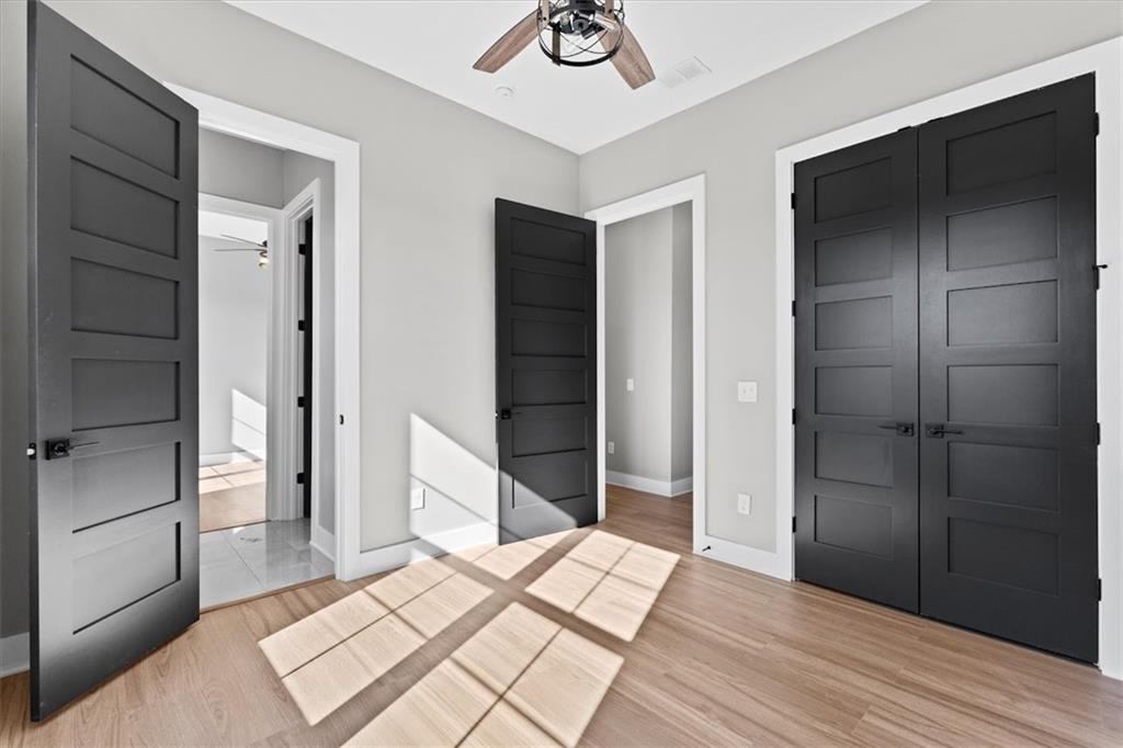 1237 Morgan Road Temple, GA 30179 - Photo 28 of 52 a bedroom with a bed and a mirror