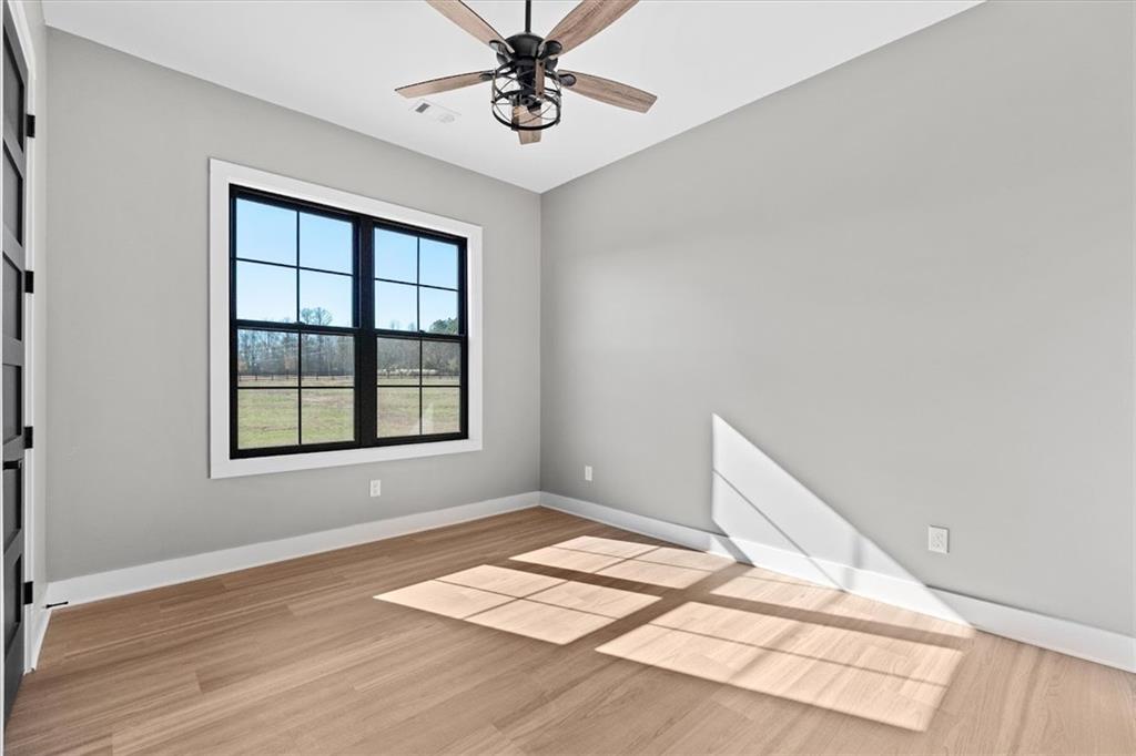 1237 Morgan Road Temple, GA 30179 - Photo 31 of 52 a view of an empty room with a window