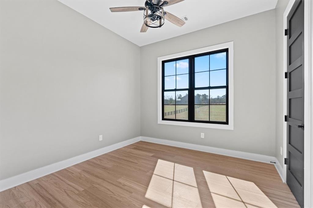 1237 Morgan Road Temple, GA 30179 - Photo 32 of 52 an empty room with a window