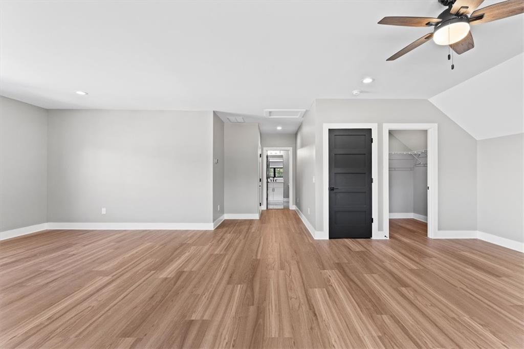 1237 Morgan Road Temple, GA 30179 - Photo 38 of 52 a view of empty room with wooden floor and fan