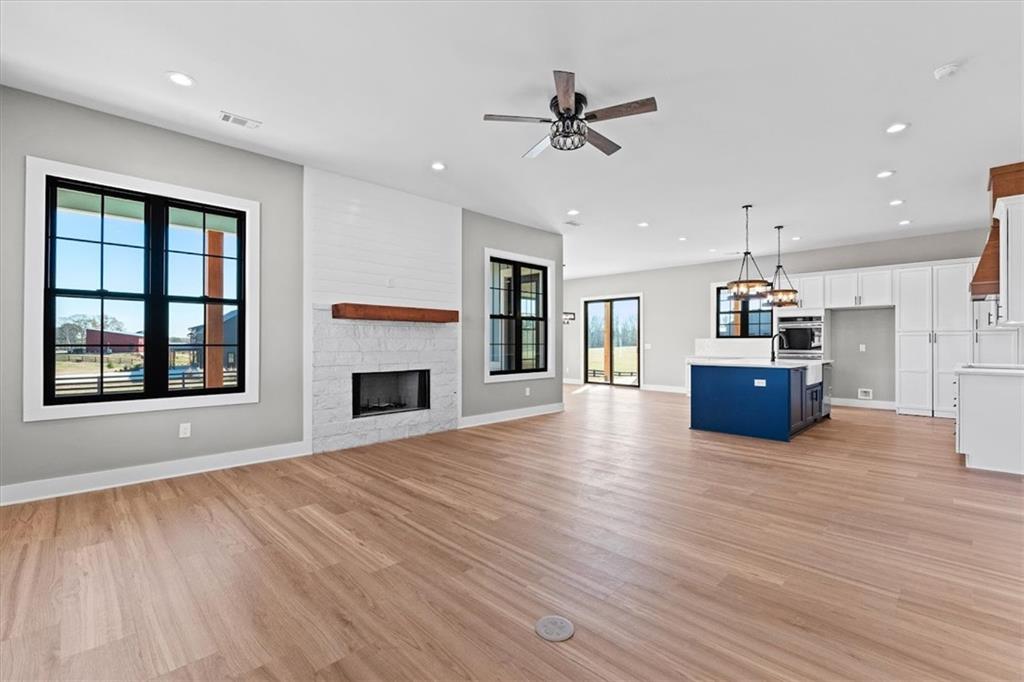1237 Morgan Road Temple, GA 30179 - Photo 9 of 52 a living room with furniture and a fireplace