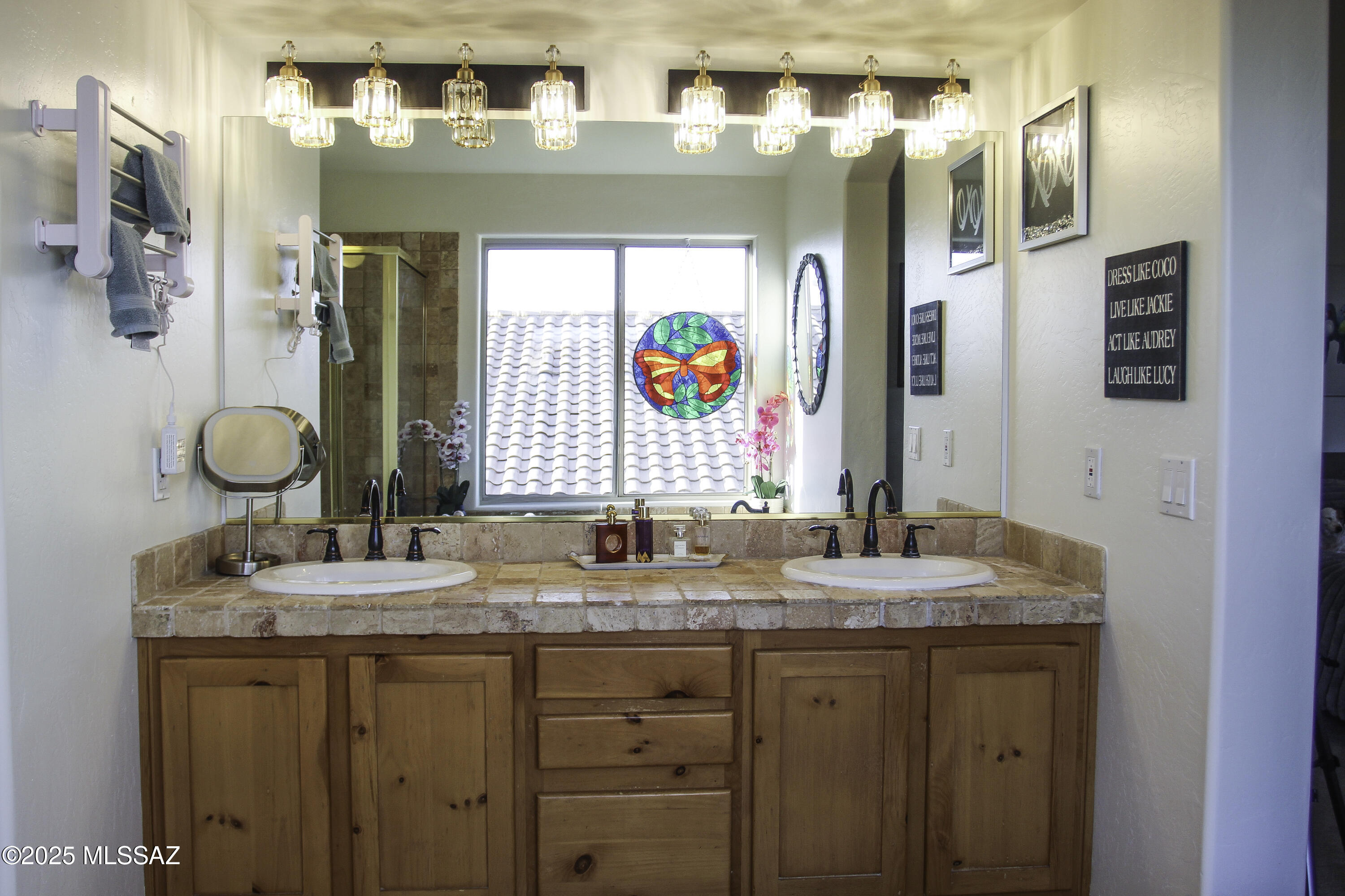 5202 Spring View Drive Tucson, AZ 85749 - Photo 33 of 49 a bathroom with a granite countertop sink and a mirror