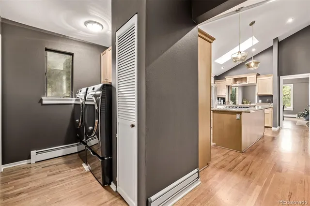 a bathroom with a sink vanity and a mirror