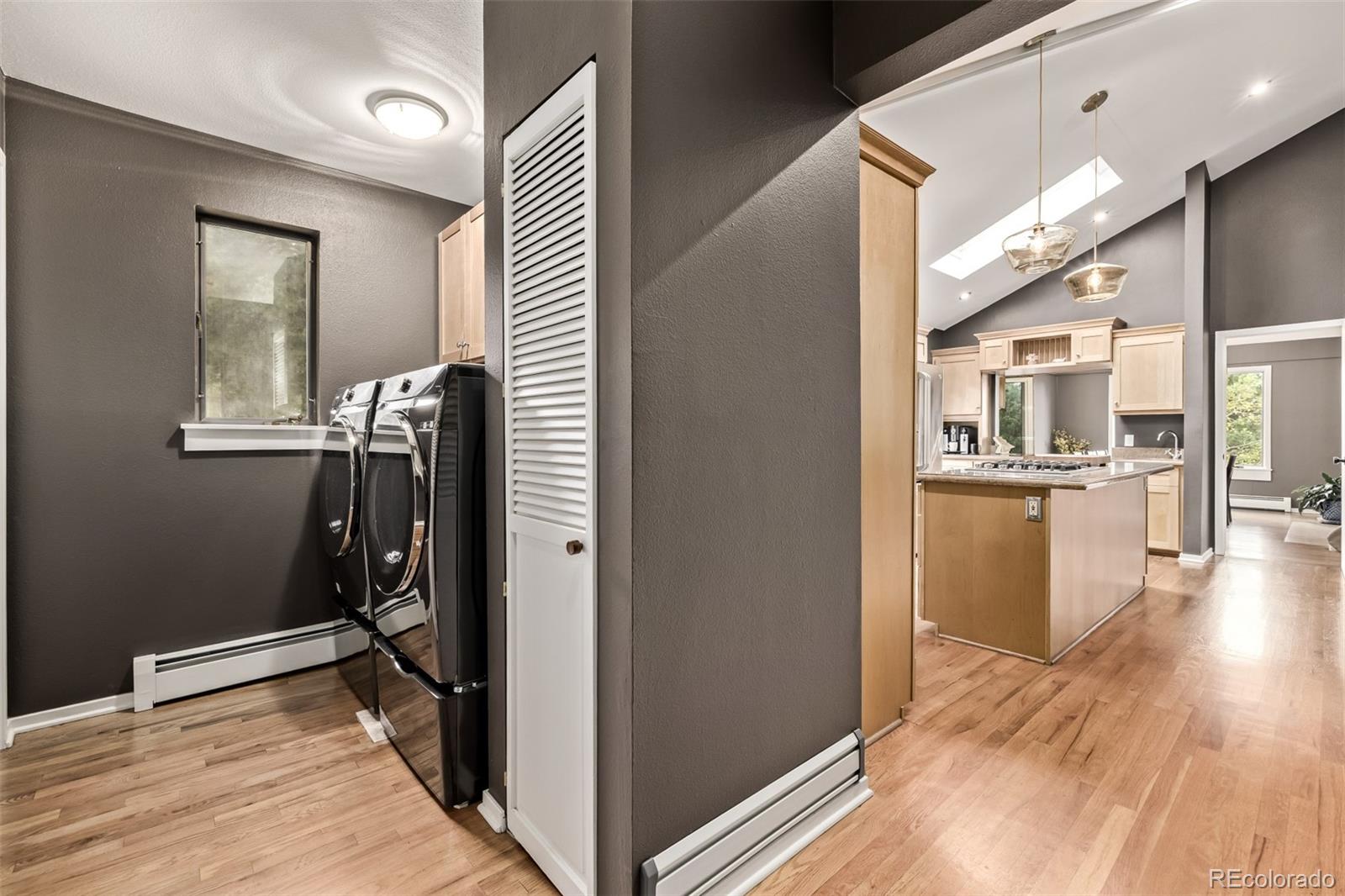 1139 Genesee Vista Road Golden, CO 80401 - Photo 20 of 43 a view of a kitchen cabinets and wooden floor