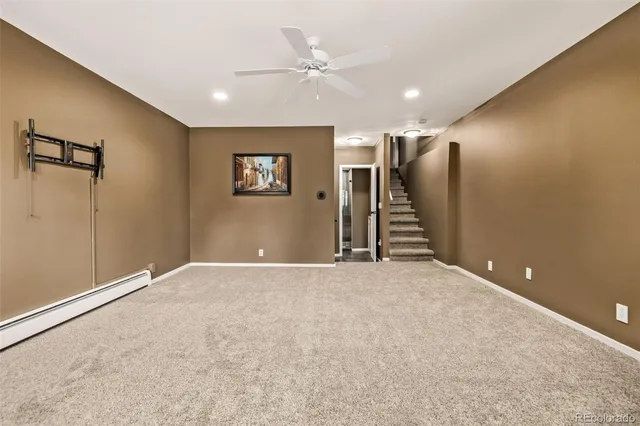 a bathroom with a double vanity sink mirror and shower